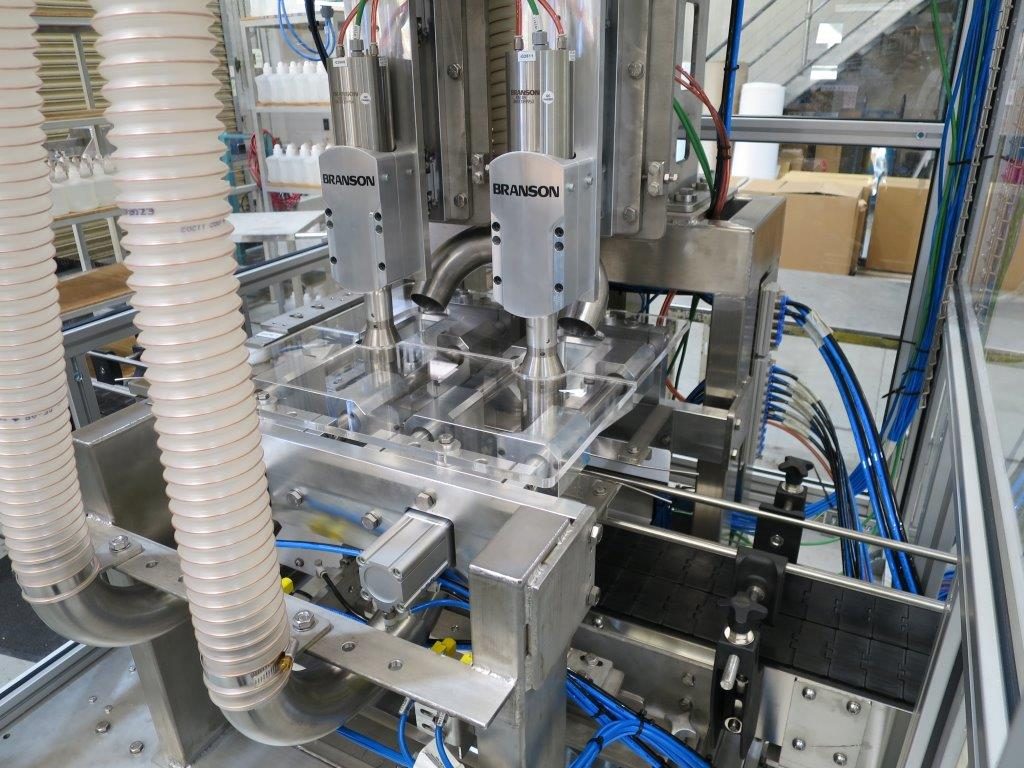 Twin-head Branson ultrasonic welding cell