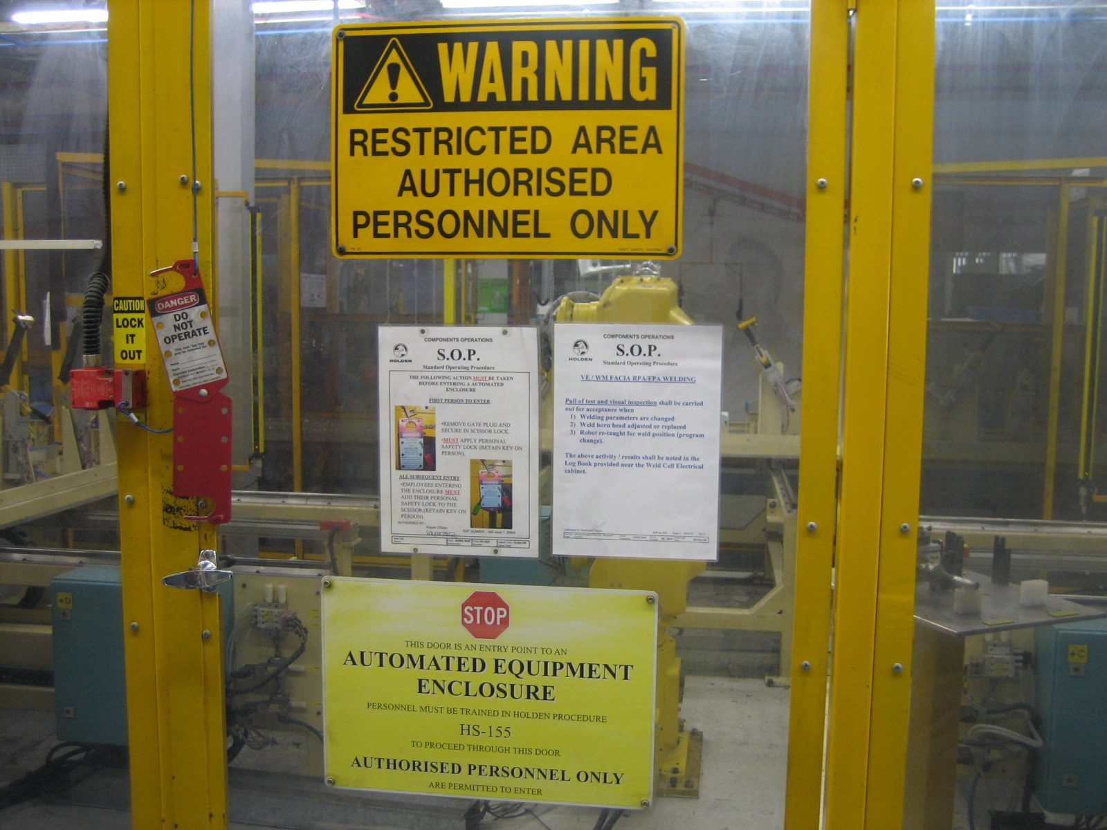 Automated enclosure safety signage